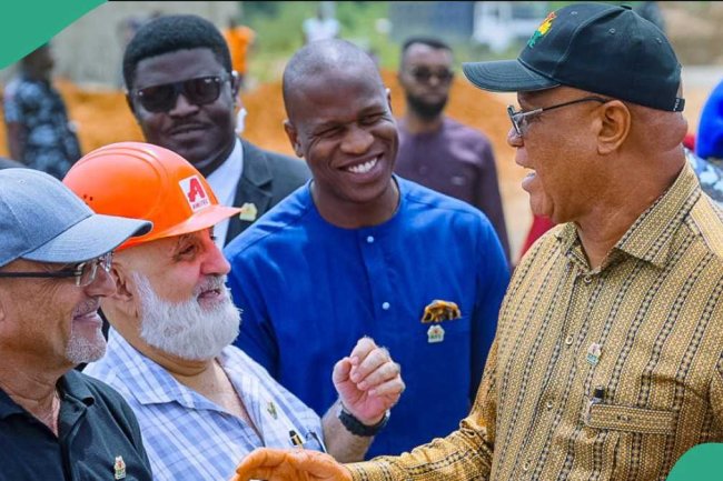 Governor Eno questions contractor at hospital construction site